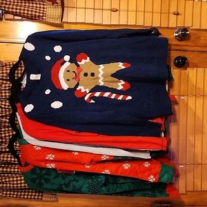 Christmas sweaters. 3 are 2X. One is 1X  and one is large.